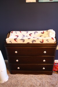 This was Eric's changing table.  Thank you Oma and Granddad for the new pull knobs and thanks to Heather for the bedding!  We ordered a special fit pad because it is a different size than standard for today