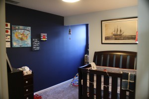 We love the paint color and the light from this little window in his reading nook.  The boat pen and ink is the mainstay in his room of the USS Constitution and thanks Mimi and Pops for the crib and Heather and Billy for all the bedding.  The America map came from Peggy and Bekah - thank you!  Can't wait to start traveling with the little guy!